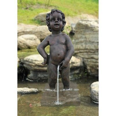 Pond statue of boy peeing